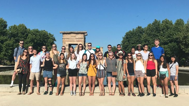 "Kaitlin Morse, second from left in the back row, poses with classmates in front of the Templo de Debod in Madrid, Spain, during her trip abroad in summer 2017."
