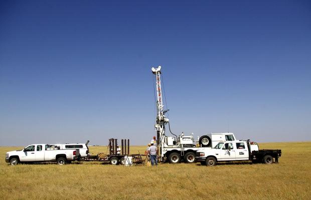 LE Core drilling in a playa basin work trucks