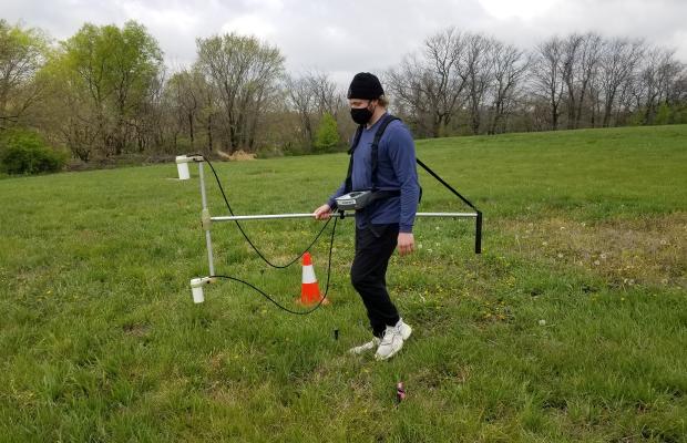 Alex Walker uses geophysical methods to look at lateral variations in soil properties, and for the presence of buried objects such as foundations or tanks, during a workshop at the KU Edwards Campus on April 16.