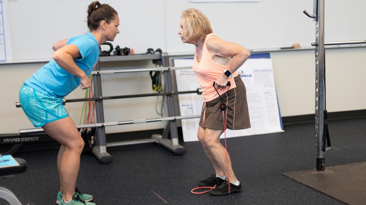 Student collaborates in exercise clinical trial with older adult