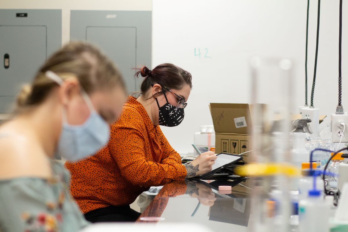 Students in the biotechnology program work in the lab at the KU Edwards Campus. 