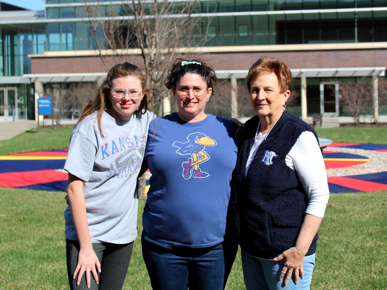 Suzie Zell (center) poses at the KU Edwards Campus 