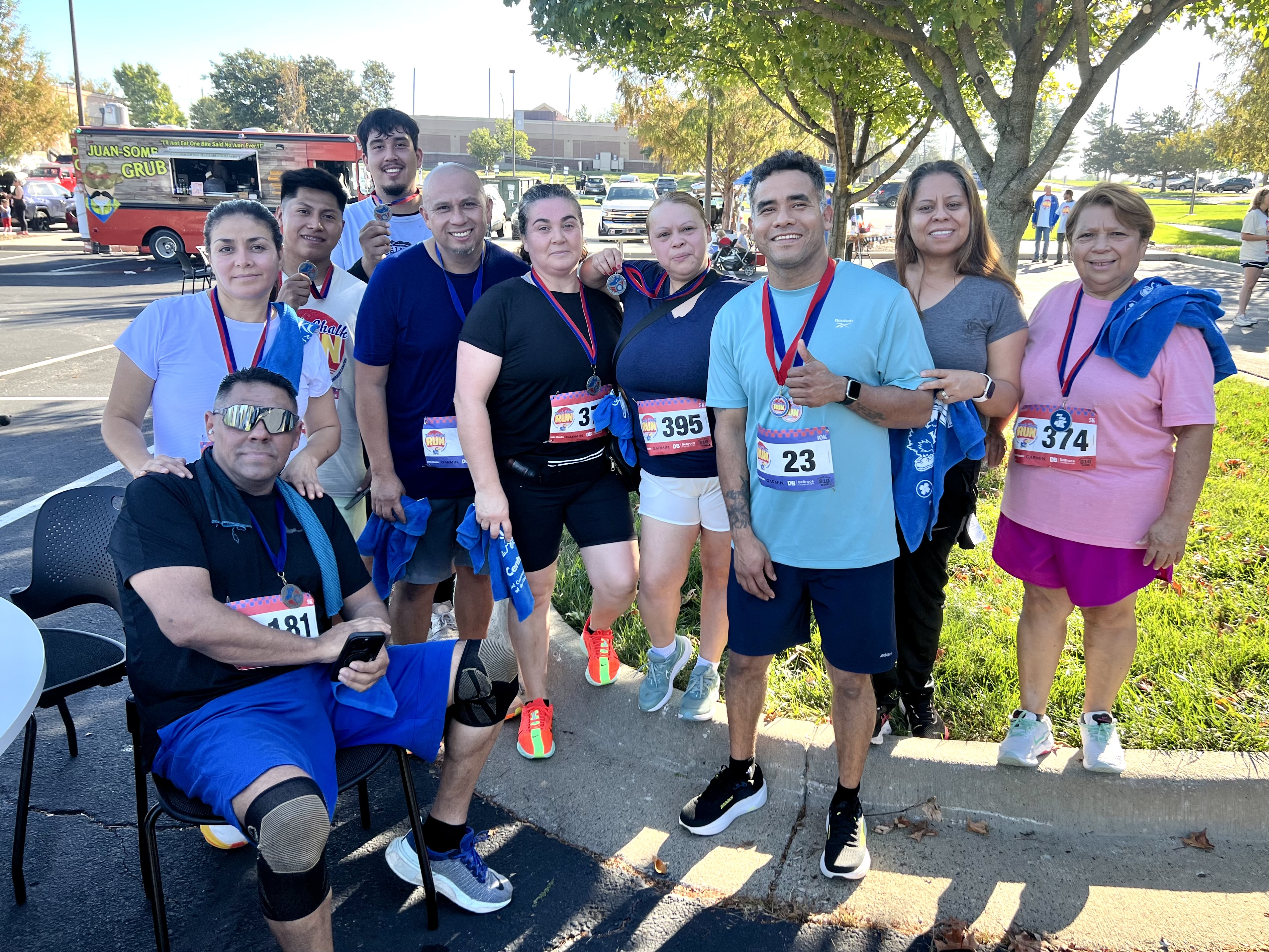 Baby Jay brought smiles to many faces with high-fives as people crossed the finish line.