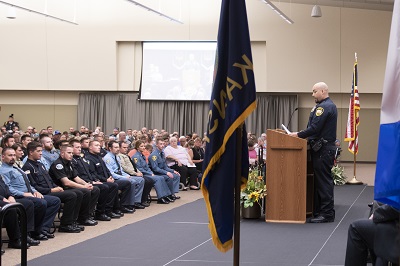 Keith Quesada, class president of the 256th KLETC graduating class, gives remarks at the commencement ceremony July 19.