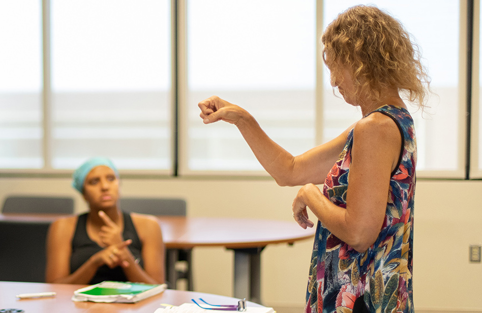Dr. Petra Horn-Marsh teaches American Sign Language V class at KU Edwards Campus.
