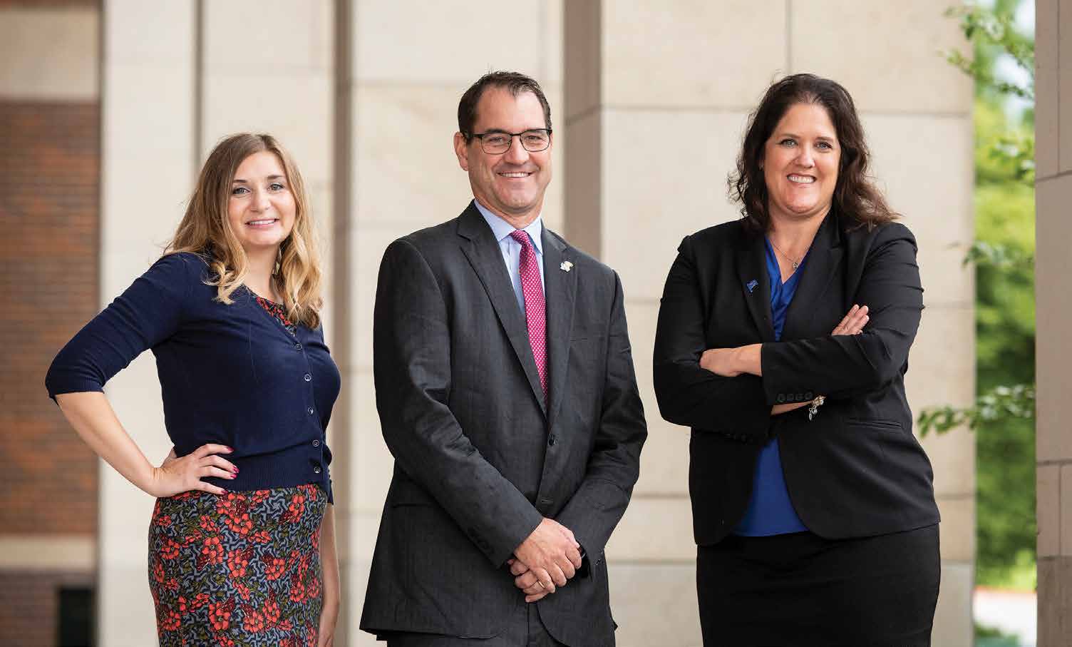 Lauren McEnaney, David Cook and Carolyn McKnight believe the program offers career-oriented students in Kansas City a cost-efficient way to attend KU. Photo by Steve Puppe.
