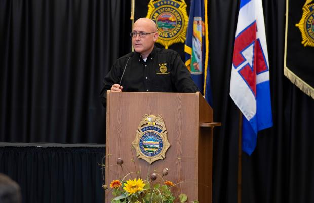 Kansas Law Enforcement Training Center executive director speaking at podium